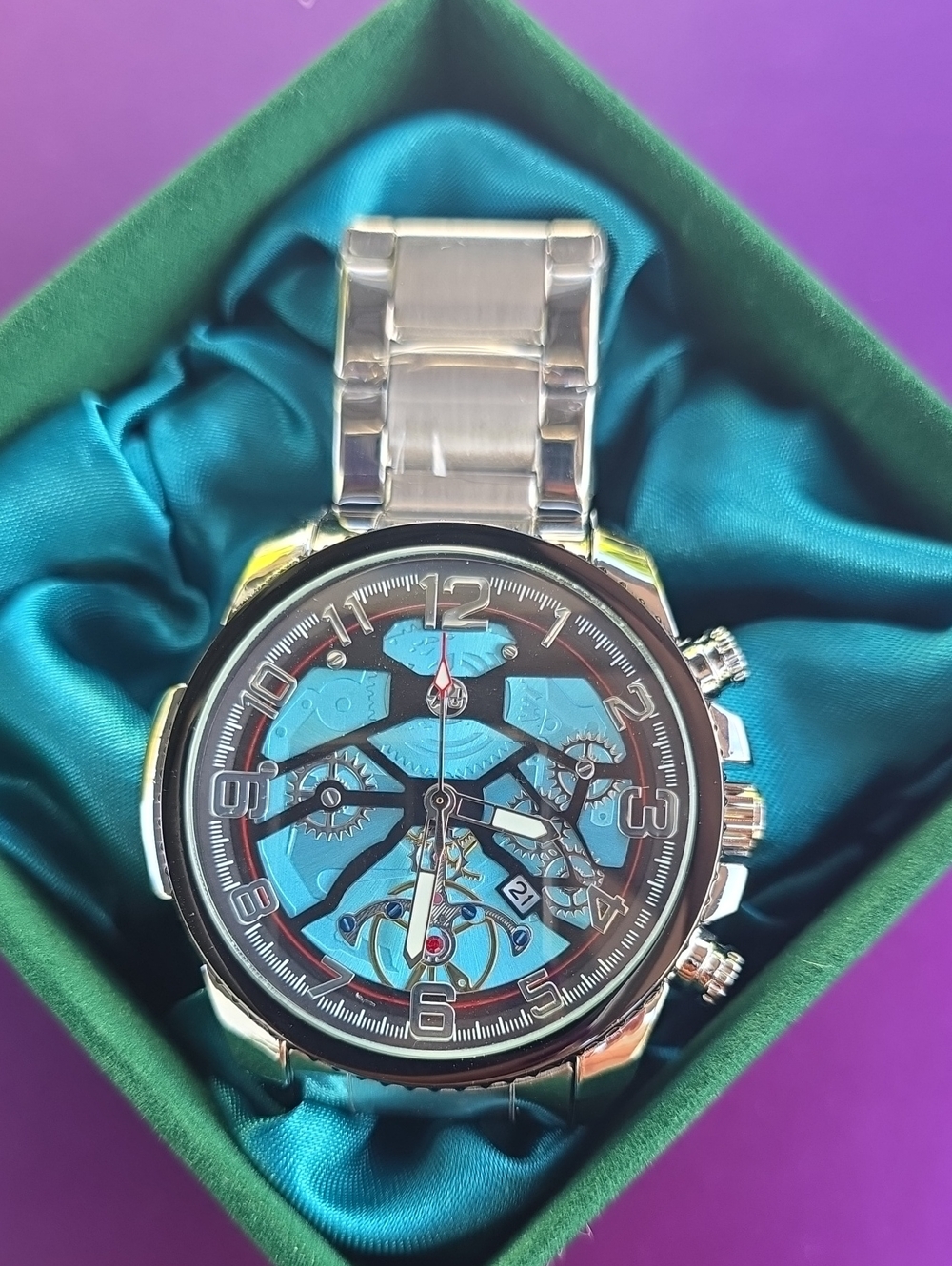 673. Men's Silver Skeleton Watch with Turquoise Dial